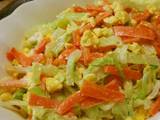 A picture of Colorful Egg and Vegetable Salad.