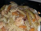 A picture of shrimps & vegetables in butter lemon sauce.