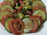 A picture of Cucumber and tomato salad.