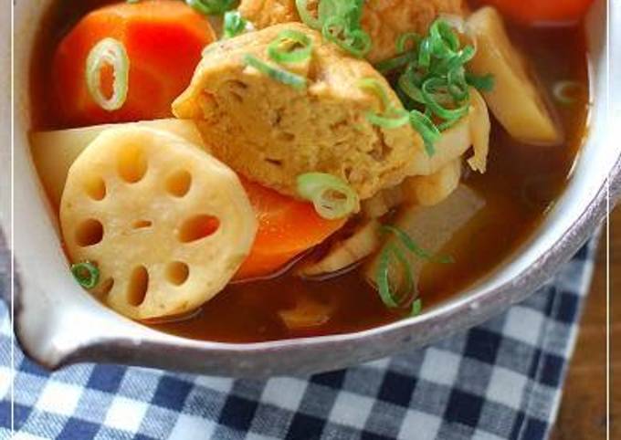 A picture of Japanese-Style Curry Soup with Fishcakes and Root Vegetables.