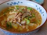 A picture of Spicy Udon Noodles with Lots of Vegetables.