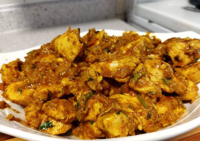 A picture of Chicken masala fry.