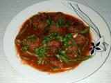 A picture of Spicy Meatballs in tomato sauce.