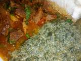 A picture of Wet fried beef,kienyeji veges with ugali.