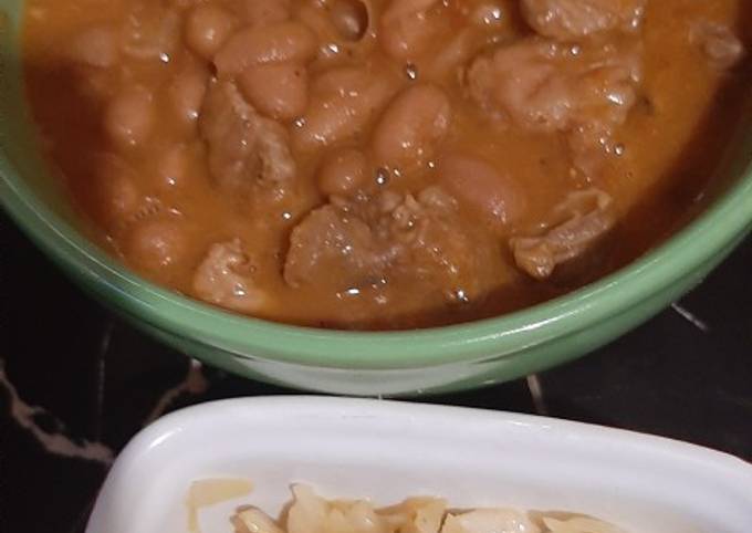 A picture of Bean Stew with buttered cabbage.