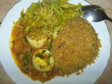 A picture of Rice and egg curry and steamed cabbage #jikoni weekly challenge.