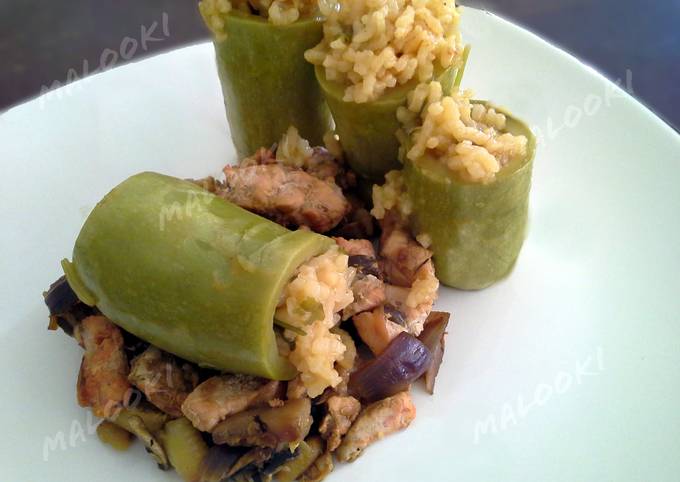 A picture of Egyptian mashi cosa (stuffed squash) with chicken vegetable stir fry.