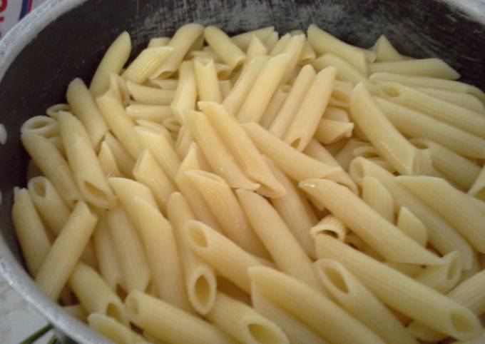 A picture of Penne with vegetables.