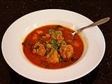 A picture of Meatballs in Tomato Vegetable Broth.