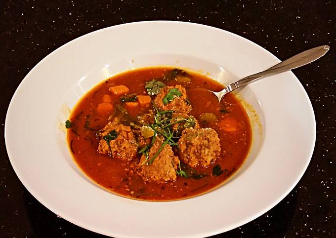 A picture of Meatballs in Tomato Vegetable Broth.