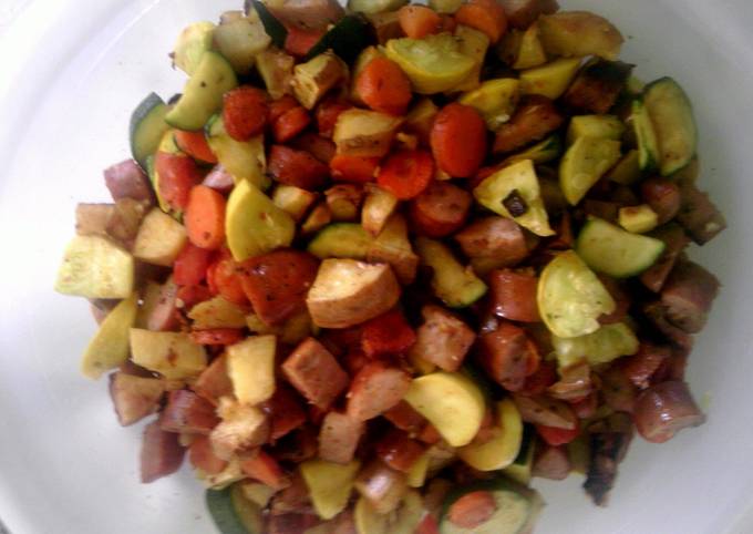 A picture of Roasted kielbasa and vegetables.