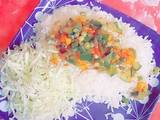 A picture of White Rice with veg source.