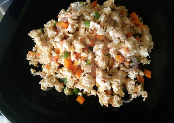 A picture of Scrambled vegetable fried eggs.