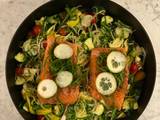 A picture of One-pan roasted salmon, market vegetables, lemon & olive oil from Spain.