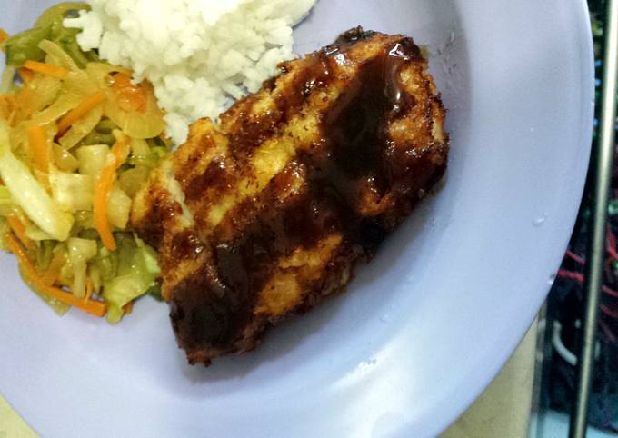 A picture of Pork Tonkatsu with Buttered Vegetables.