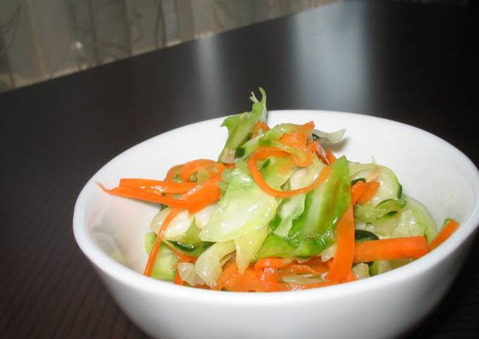 A picture of A Pickled Salad with Delicious Vegetables.