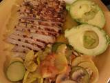 A picture of Marinated Pork Chops and Cooked Vegetables..