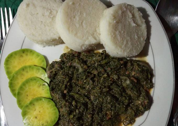 A picture of Creamy coconut vegetables with ugali.