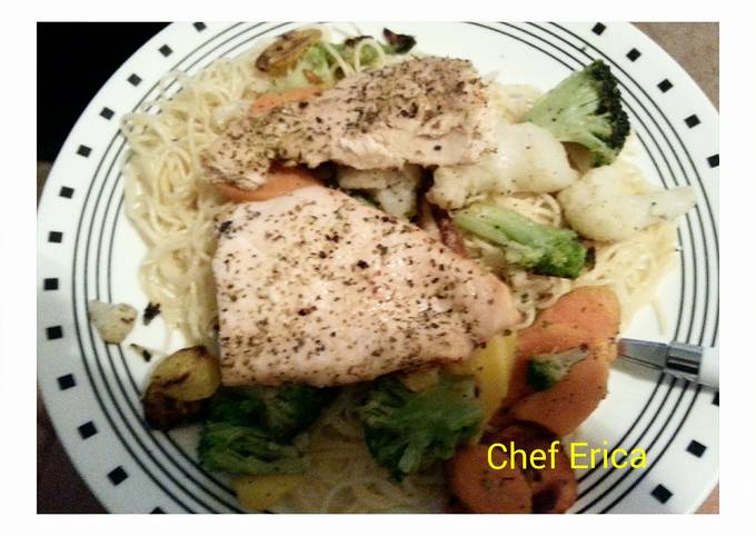 A picture of Baked fish with vegetable pasta.