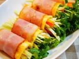 A picture of Raw Vegetables Wrapped with Bacon and Eggs.