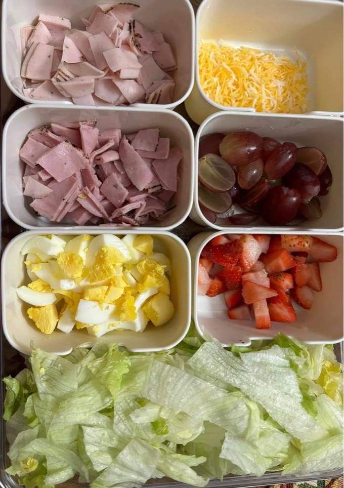 A picture of Mini salad bar using leftover lettuce from taco night.