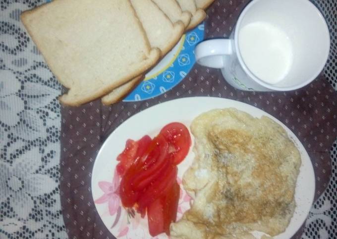 A picture of Black pepper eggs,sliced tomatoes.