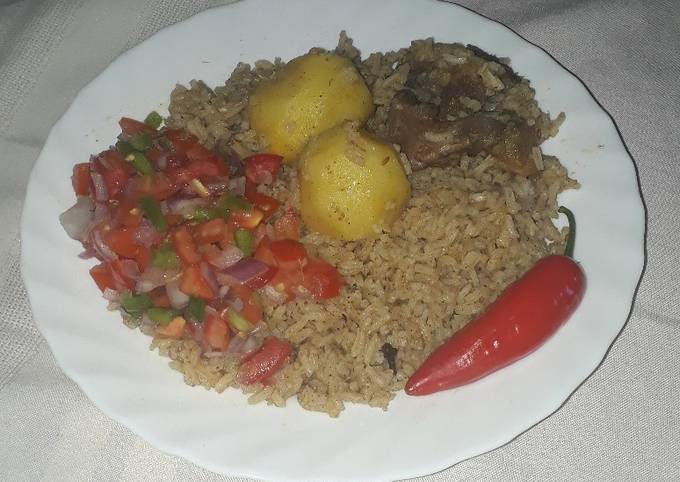 A picture of Tomato Paste Pilau #festivedishcontestkakamega#authormarathon#.