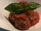 A picture of Meatballs in tomato concase.