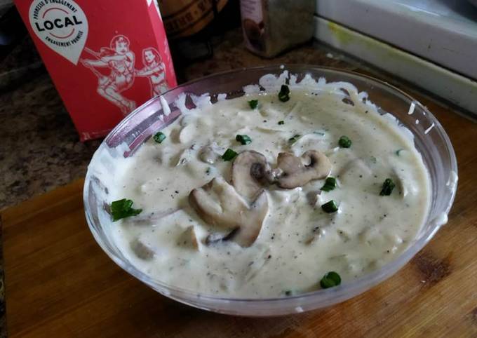 A picture of Cream of mushroom soup.