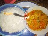 A picture of Rice with vegetables souce.