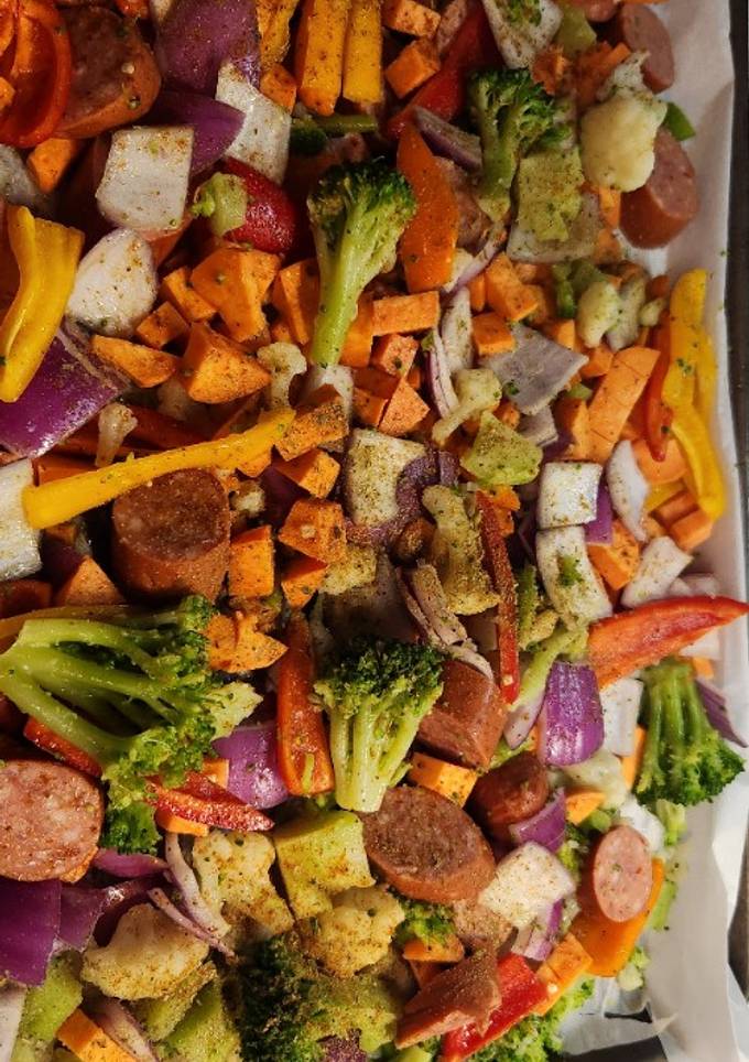 A picture of Kielbasa and vegetable sheet pan dinner.