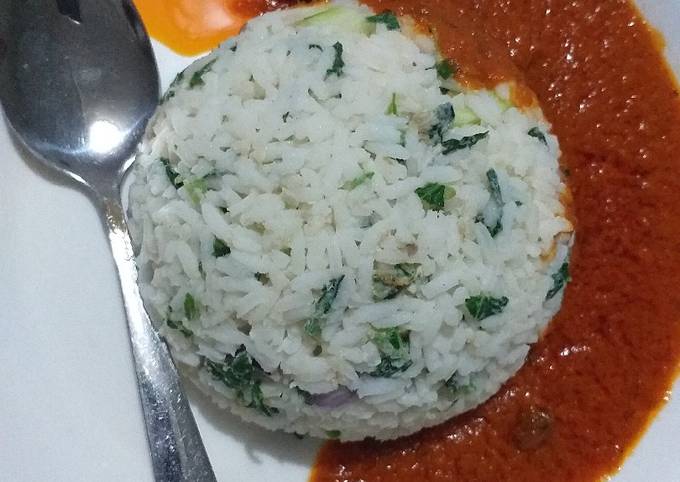 A picture of Vegetable rice with stew.