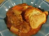 A picture of Lamb Meatball & Root Vegetable Stew with Drop Biscuits.