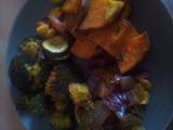 A picture of Roasted vegetables and chicken.