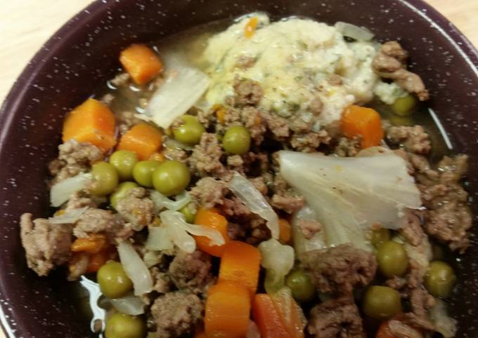 A picture of Vegetable Beef Soup with Egg Dumplings.