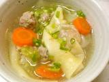 A picture of A Wonton Soup with Plenty of Vegetables.