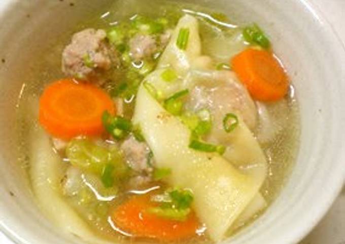 A picture of A Wonton Soup with Plenty of Vegetables.