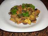 A picture of Eggplants and zucchini curry# coconut contenst.