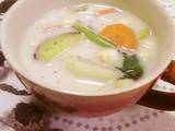 A picture of Vegetable-Packed Soup With Soy Milk.