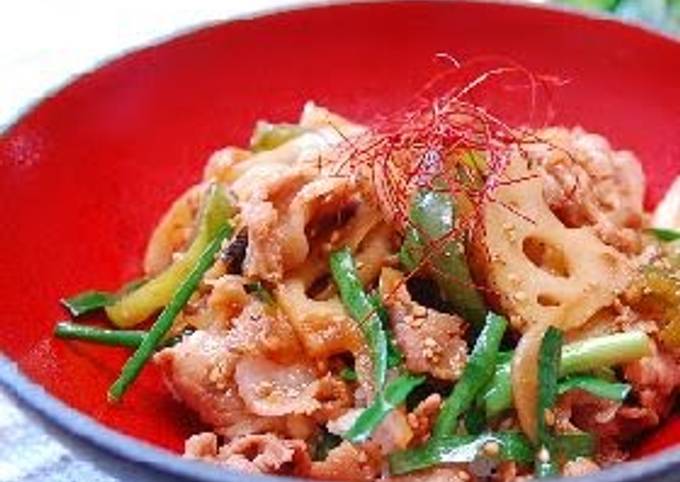 A picture of Bibimbap-style Pork Rice Bowl with Lots of Vegetables.