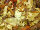 A picture of Chicken and vegetable stir fry.