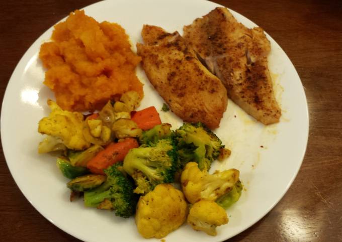 A picture of Tilapia W/Roasted Vegetables.