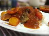 A picture of Pork Sirloin Steak With Tomato Pasta Sauce On Rice.