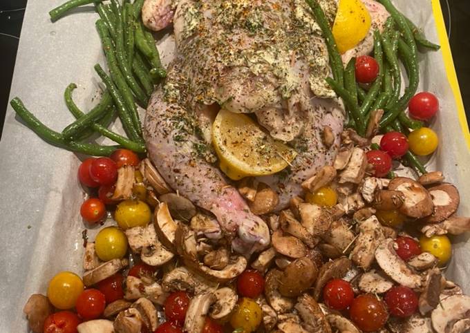 A picture of Spatchcock Herb of Provence Chicken w Lemon and vegetables (easy sheet pan dinner).