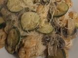 A picture of Vermicelli rice noodles with mushrooms, courgettes and prawns.