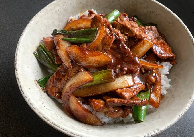 A picture of Stir-fried Beef & Onion Rice Bowl.