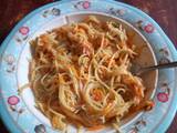 A picture of Spaghetti with vegetables.