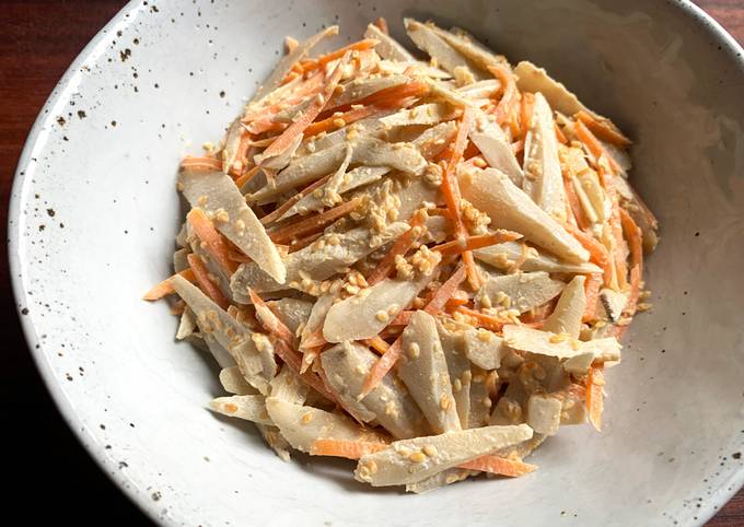 A picture of Gobō & Carrot Salad with Creamy Sesame Dressing.