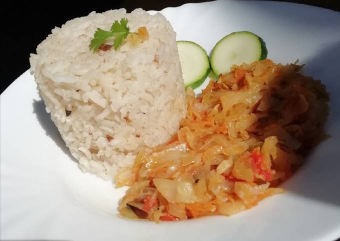 A picture of Fried cabbage with fried rice.