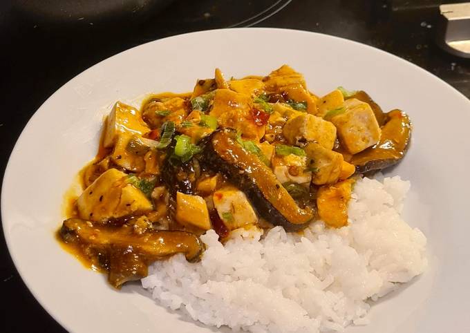 A picture of Spicy Mapo Tofu with Shiitake Mushrooms 🌶️.